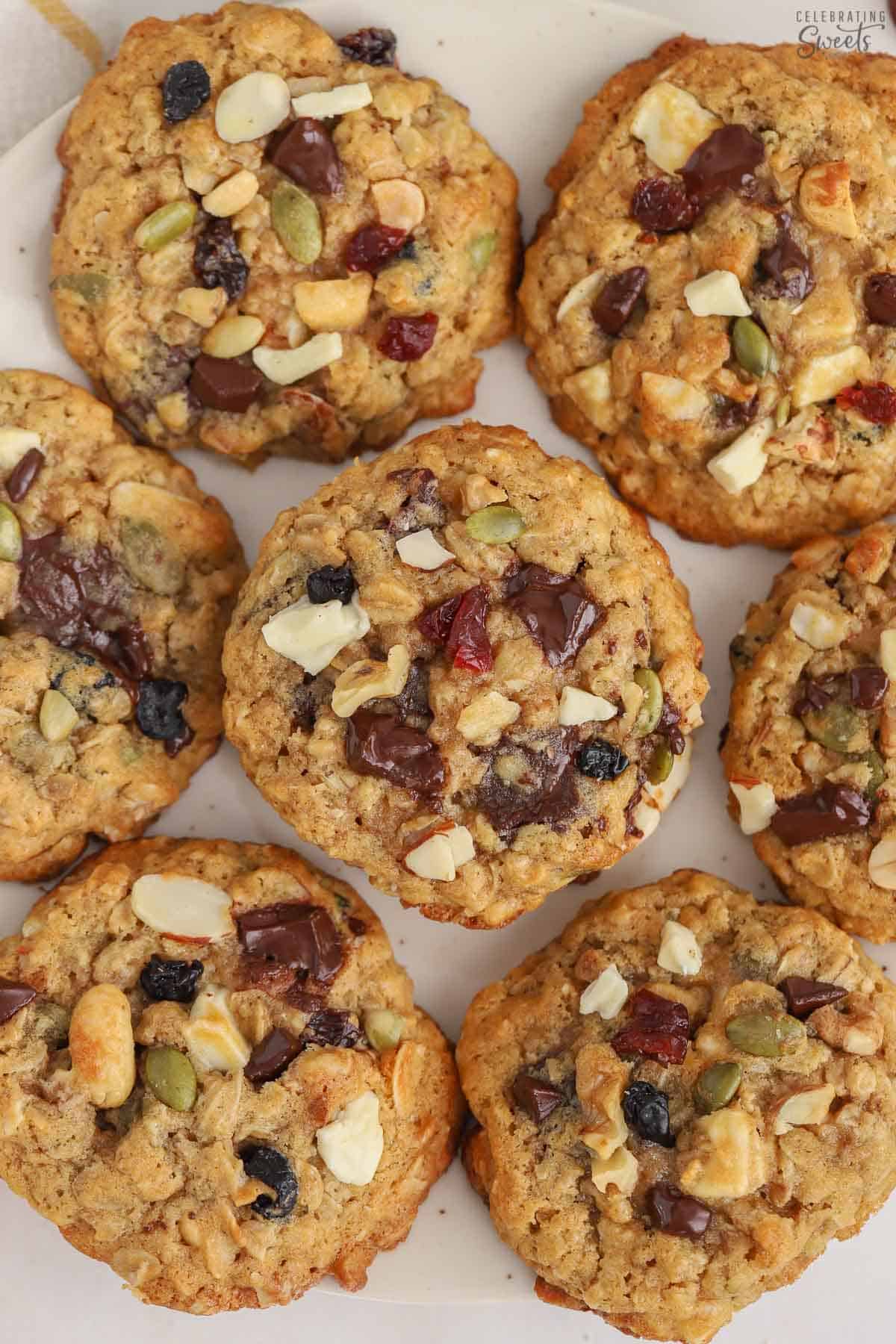 Trail mix cookies on a white plate.