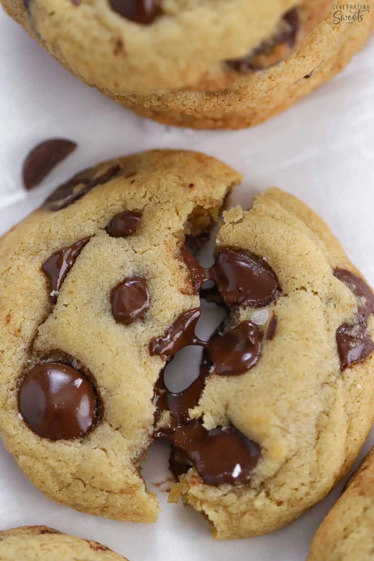 Closeup of chocolate chip cookies with melty chocolate chips.
