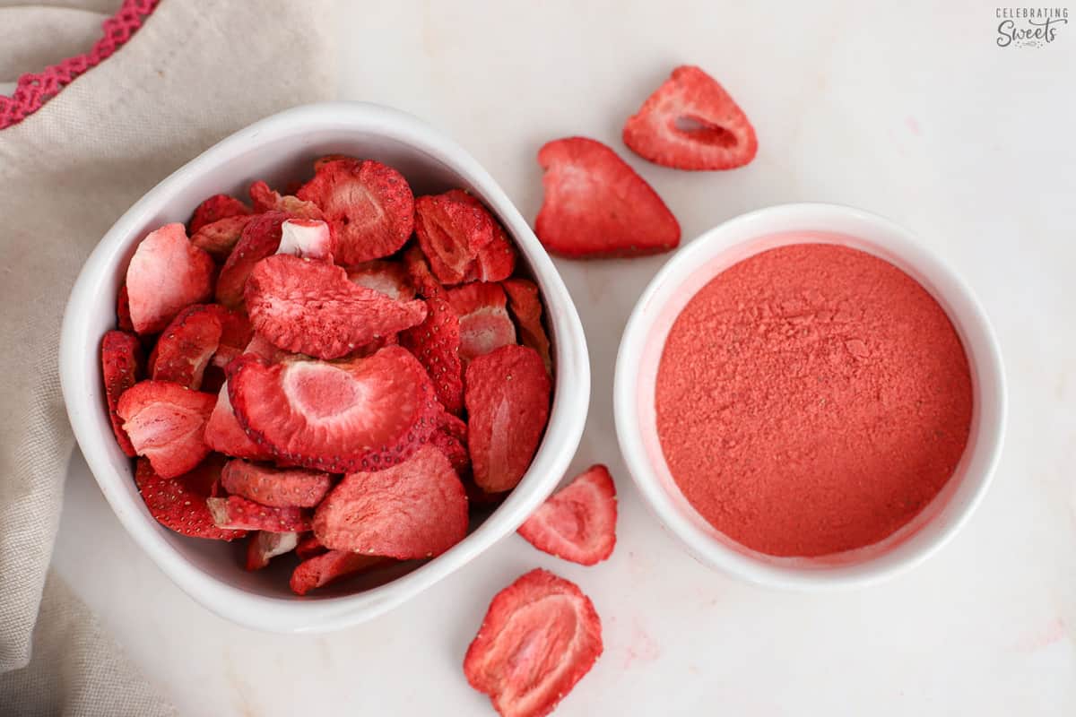 Freeze dried strawberries in a white bowl.