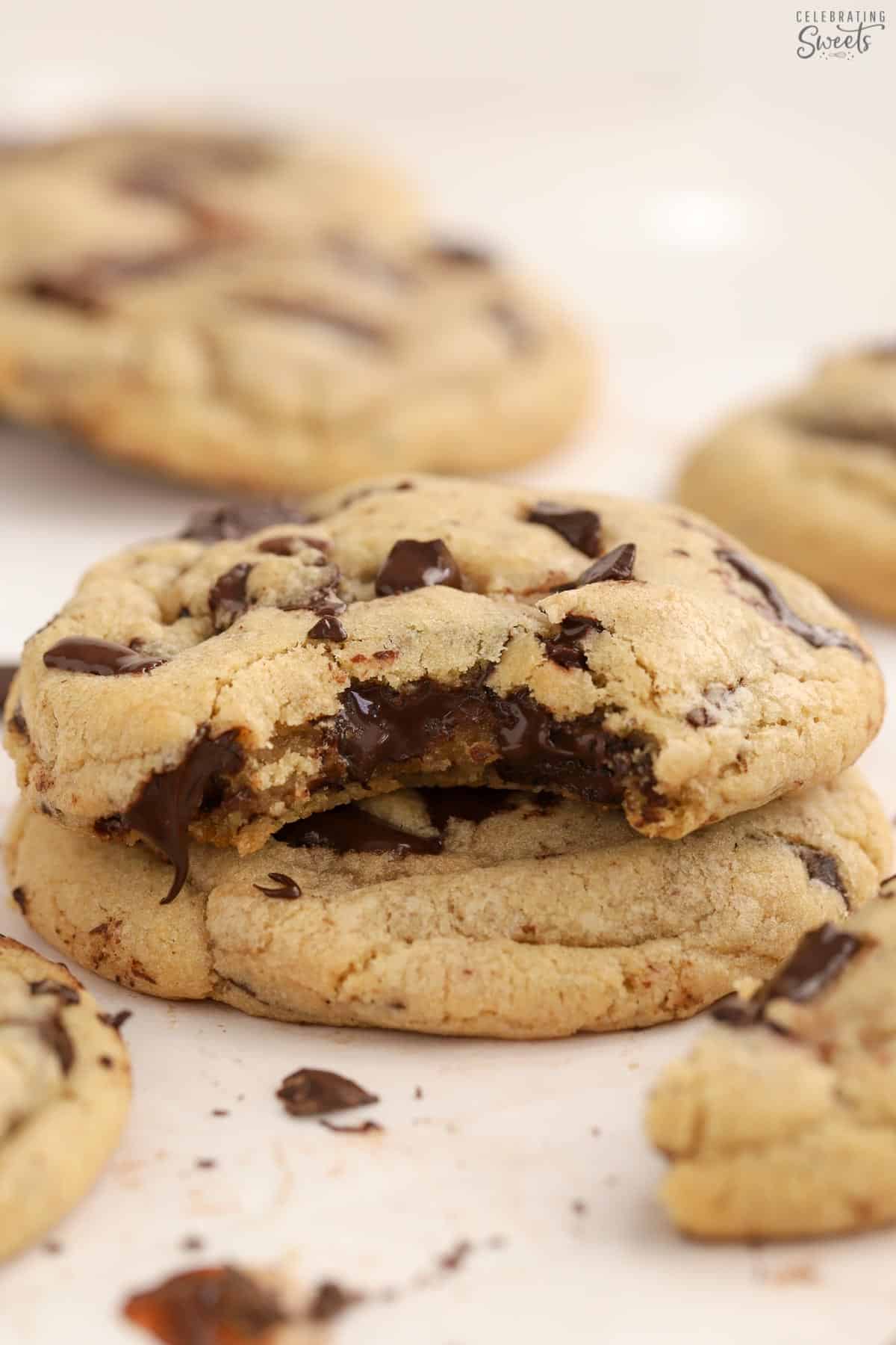 Chocolate chip cookies with a bite taken out of it.