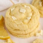 Stack of lemon cookies topped with white chocolate