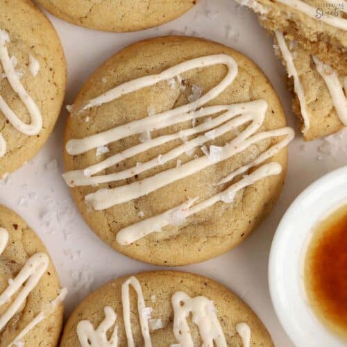 Closeup of brown butter cookie with a drizzle of icing.