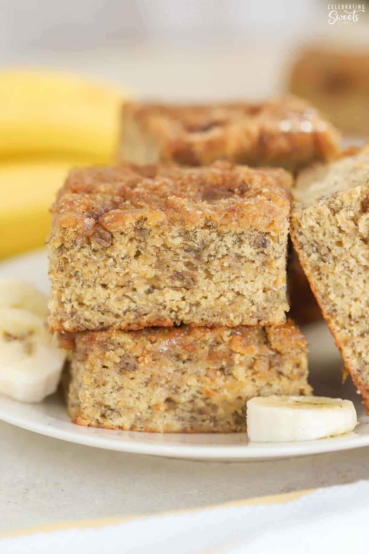 Slices of banana bread on a white plate.