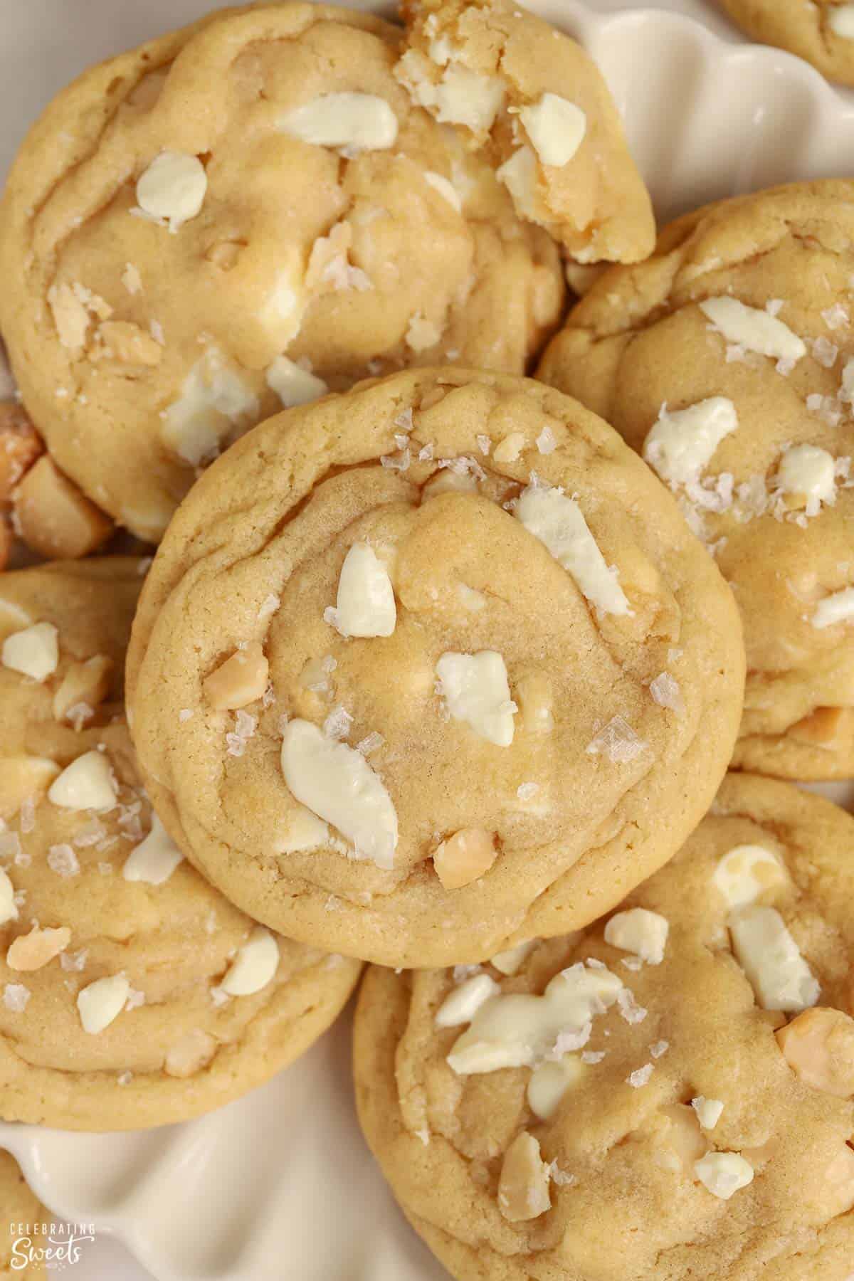 White chocolate macadamia nut cookies on a plate.