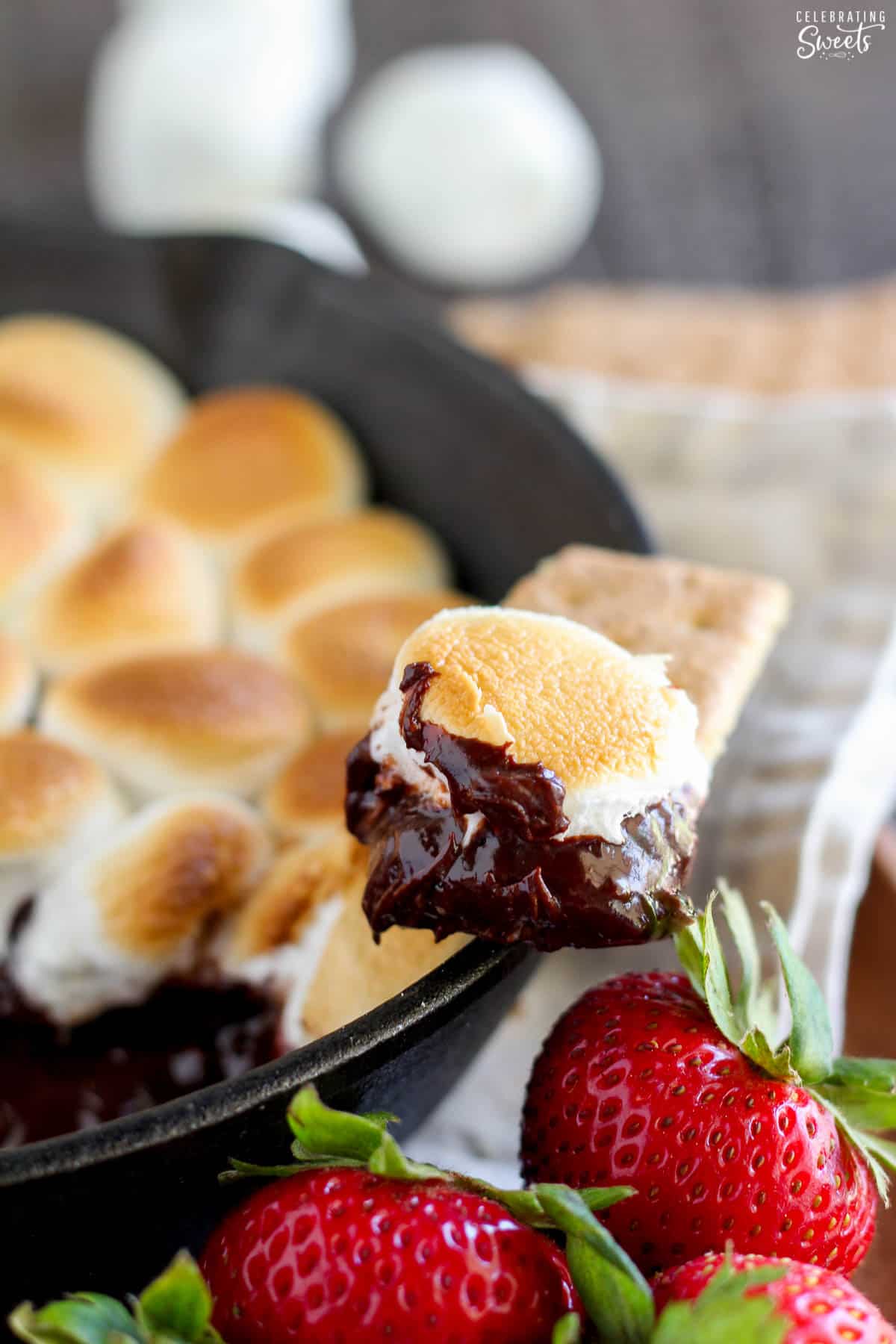 Smores dip on a graham cracker.