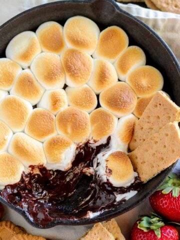 S'mores dip in a cast iron skillet.