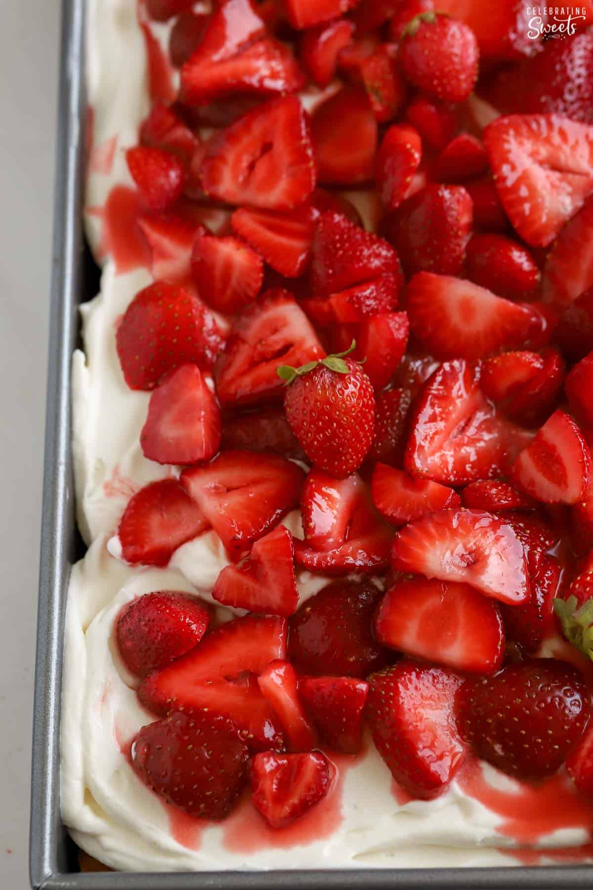Closeup of strawberry shortcake sheet cake.