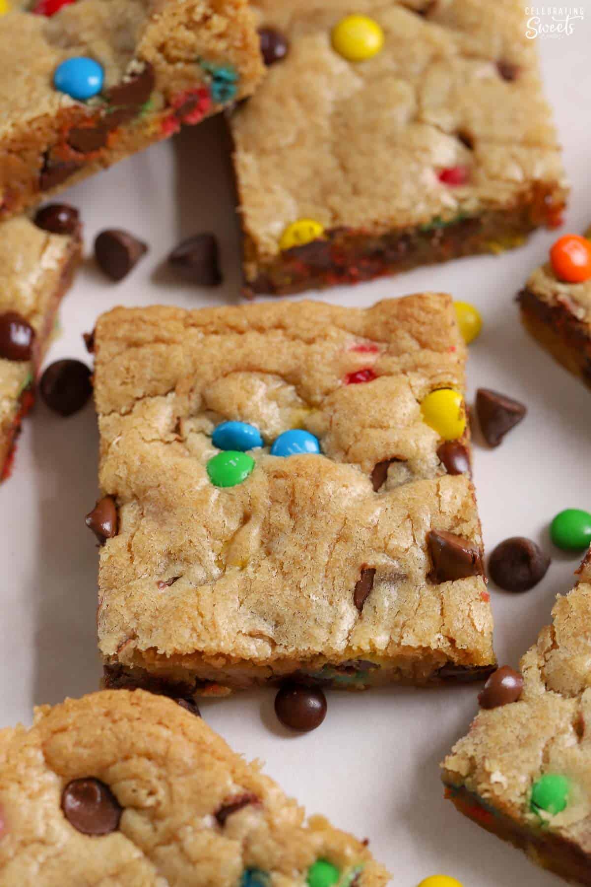 M&M Cookie bars on parchment paper.