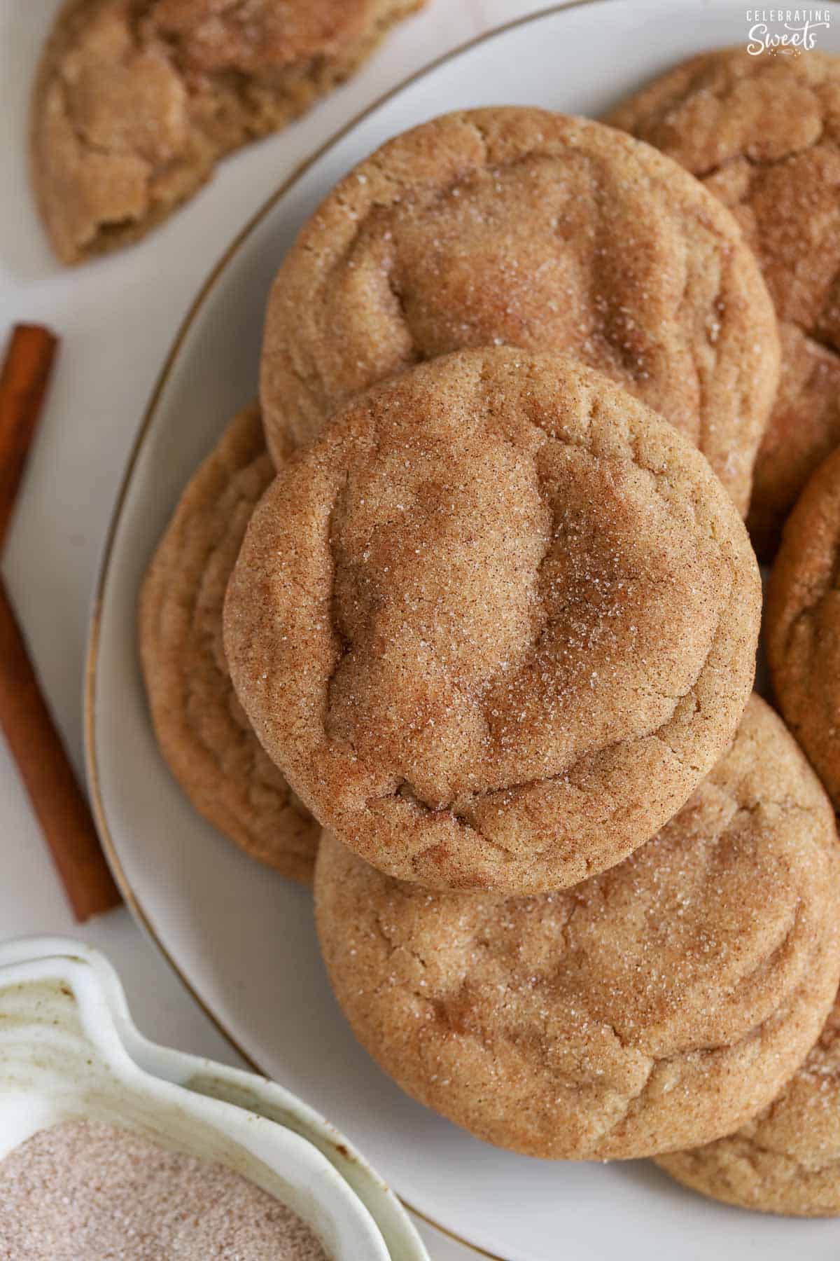 Maple snickerdoodle cookies on a grey plate.