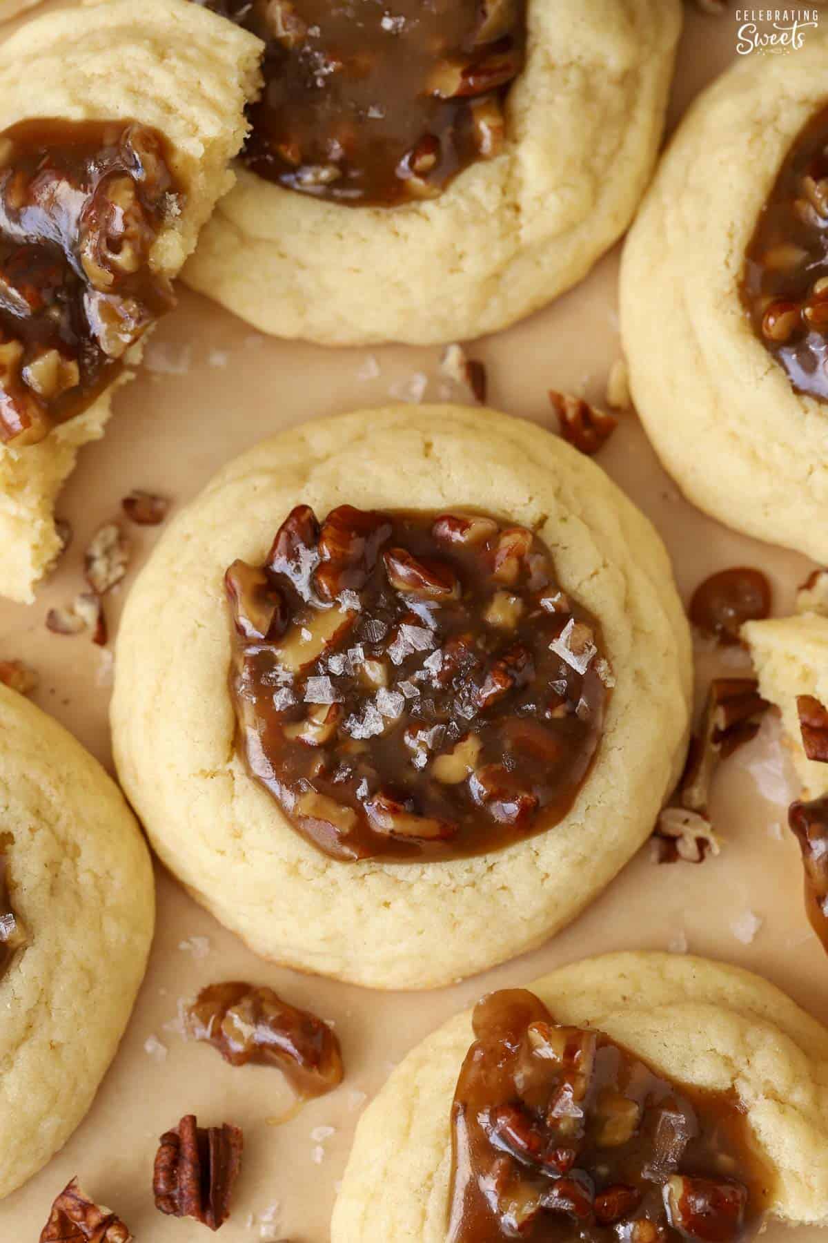 Close up of a pecan pie cookie (sugar cookie filled with caramel pecan filling).