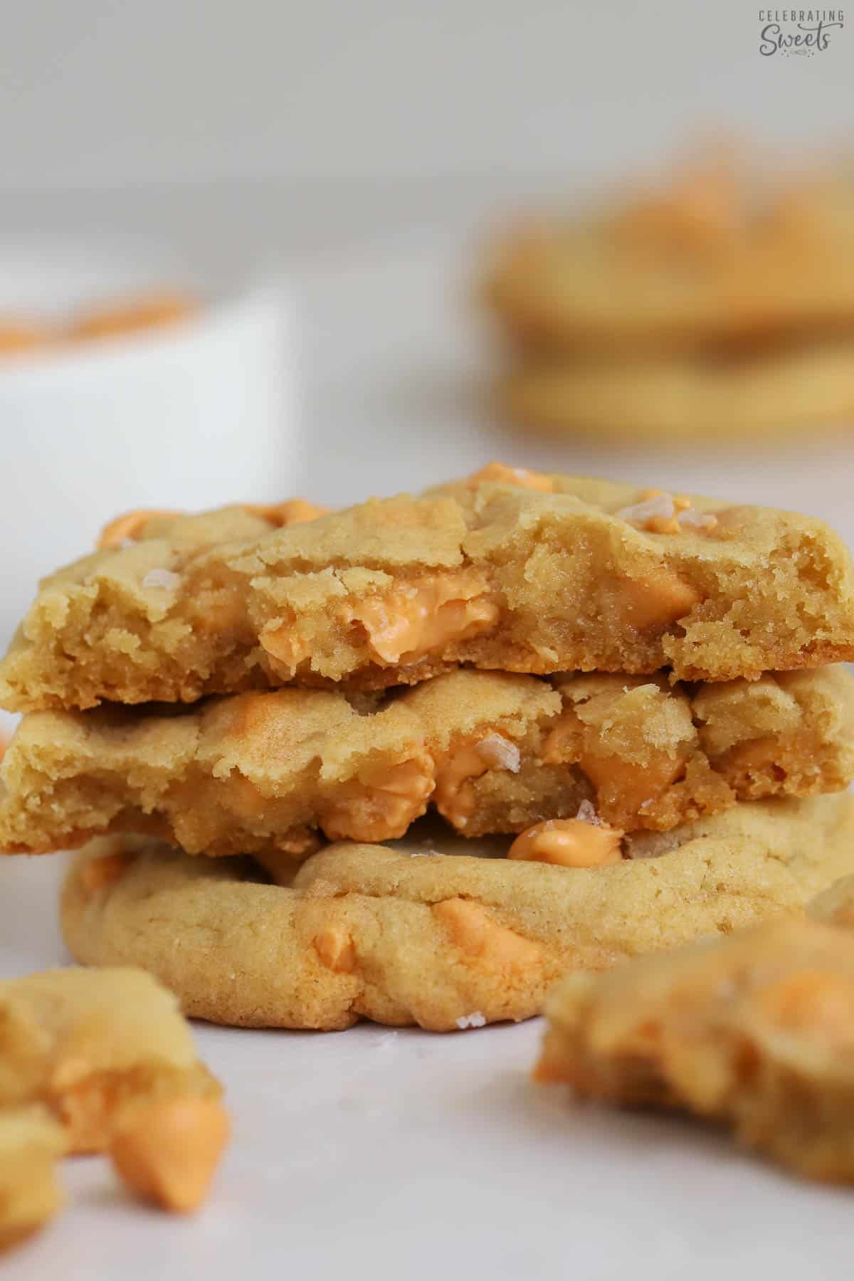 Three butterscotch cookies stacked on top of each other.