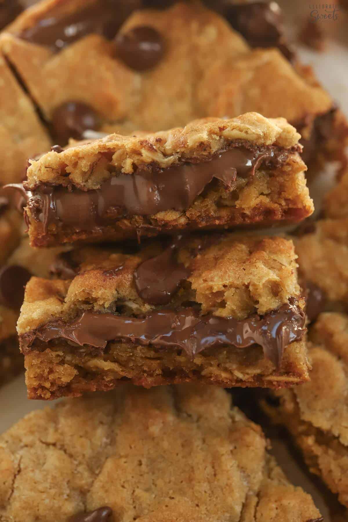 Two pieces of nutella cookie bars stacked on top of each other.