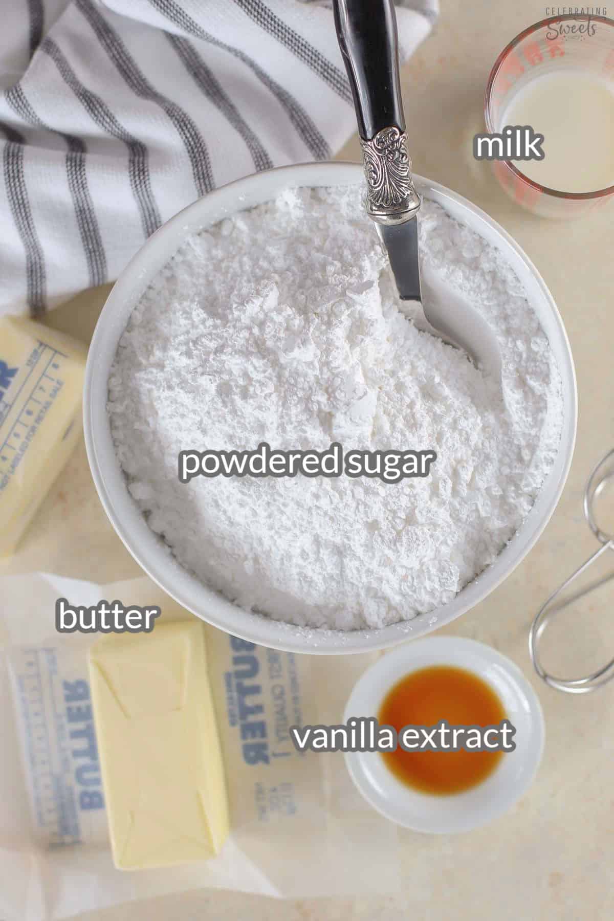 Ingredients for vanilla buttercream frosting (butter, vanilla, powdered sugar, milk).
