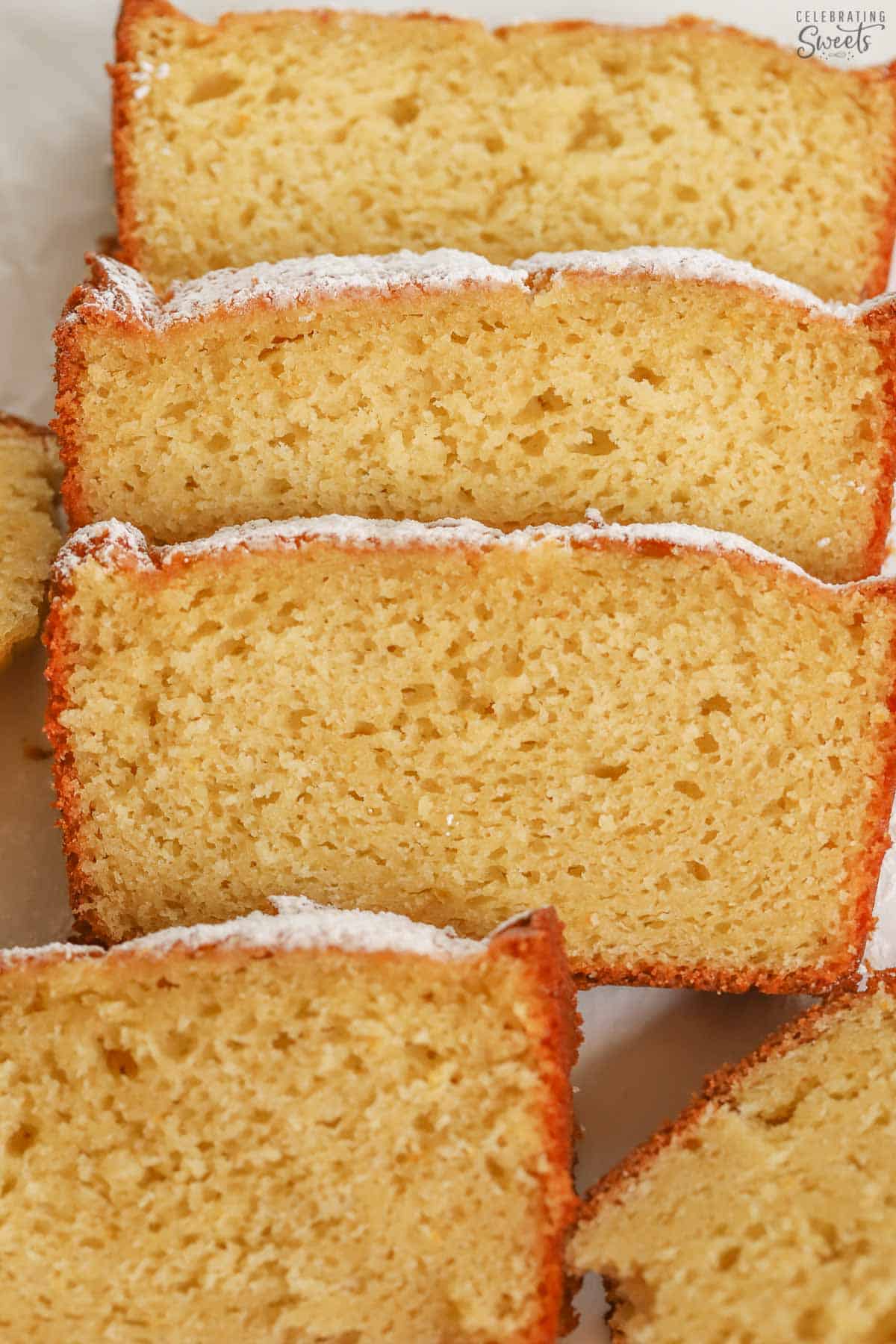 Three slices of yogurt cake on a white plate.