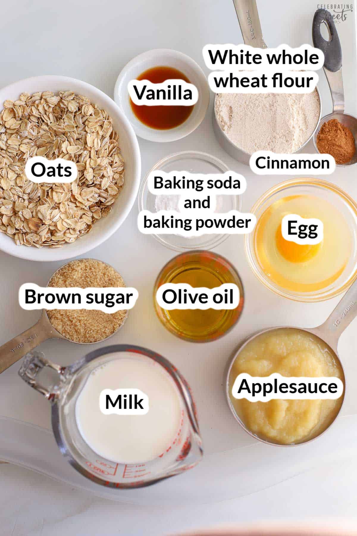 Ingredients for apple oatmeal muffins (milk, applesauce, flour, oats, brown sugar, egg, vanilla).