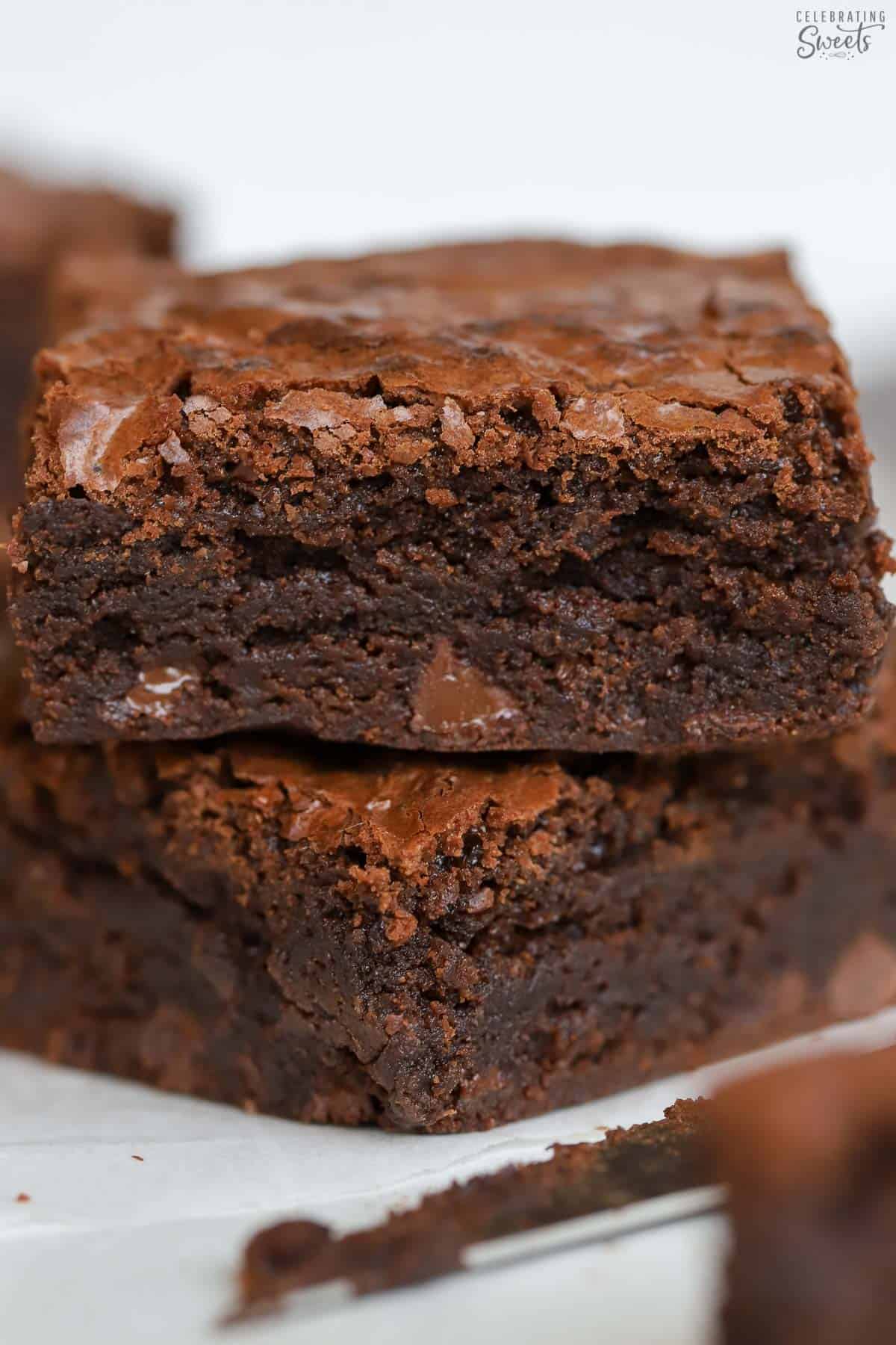 Stack of two brownies on top of each other.