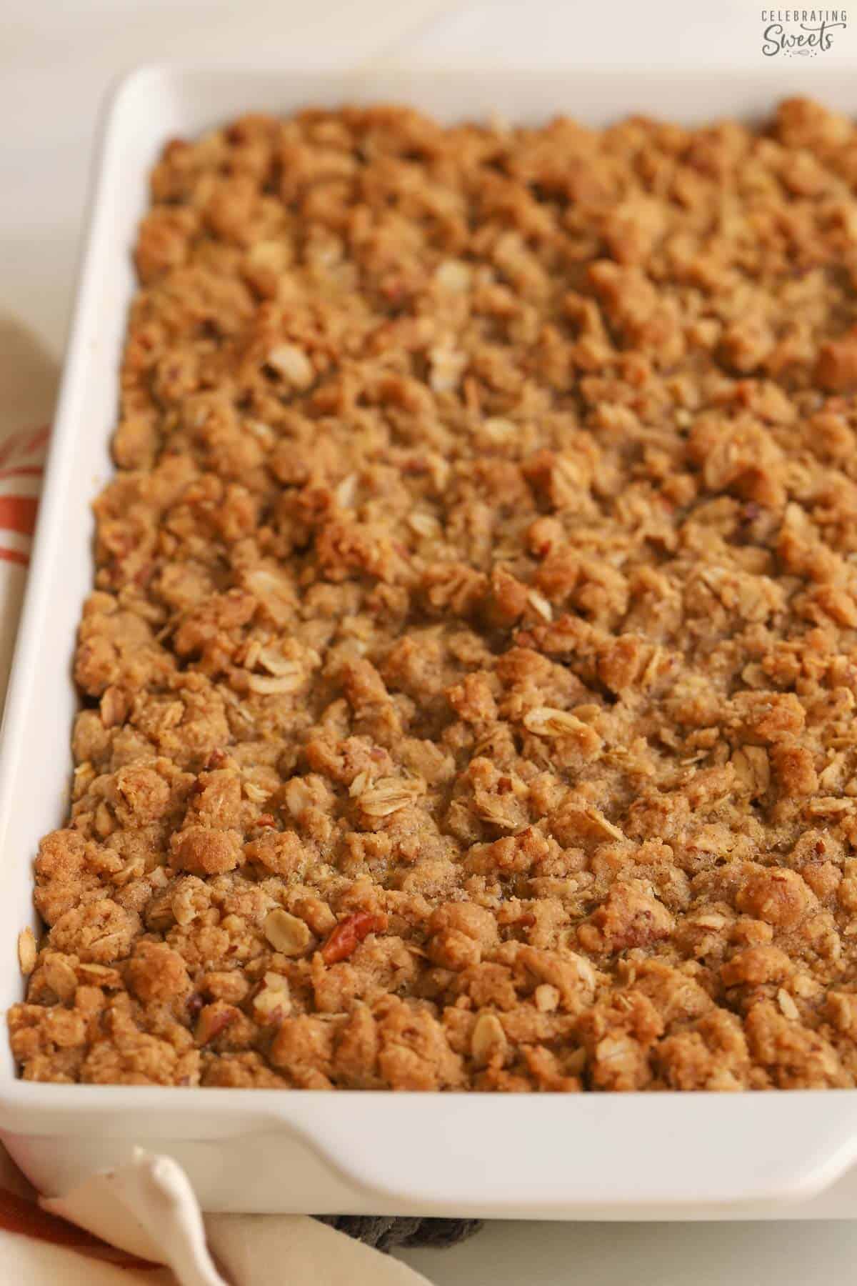 Pumpkin crisp in a white rectangular baking dish.