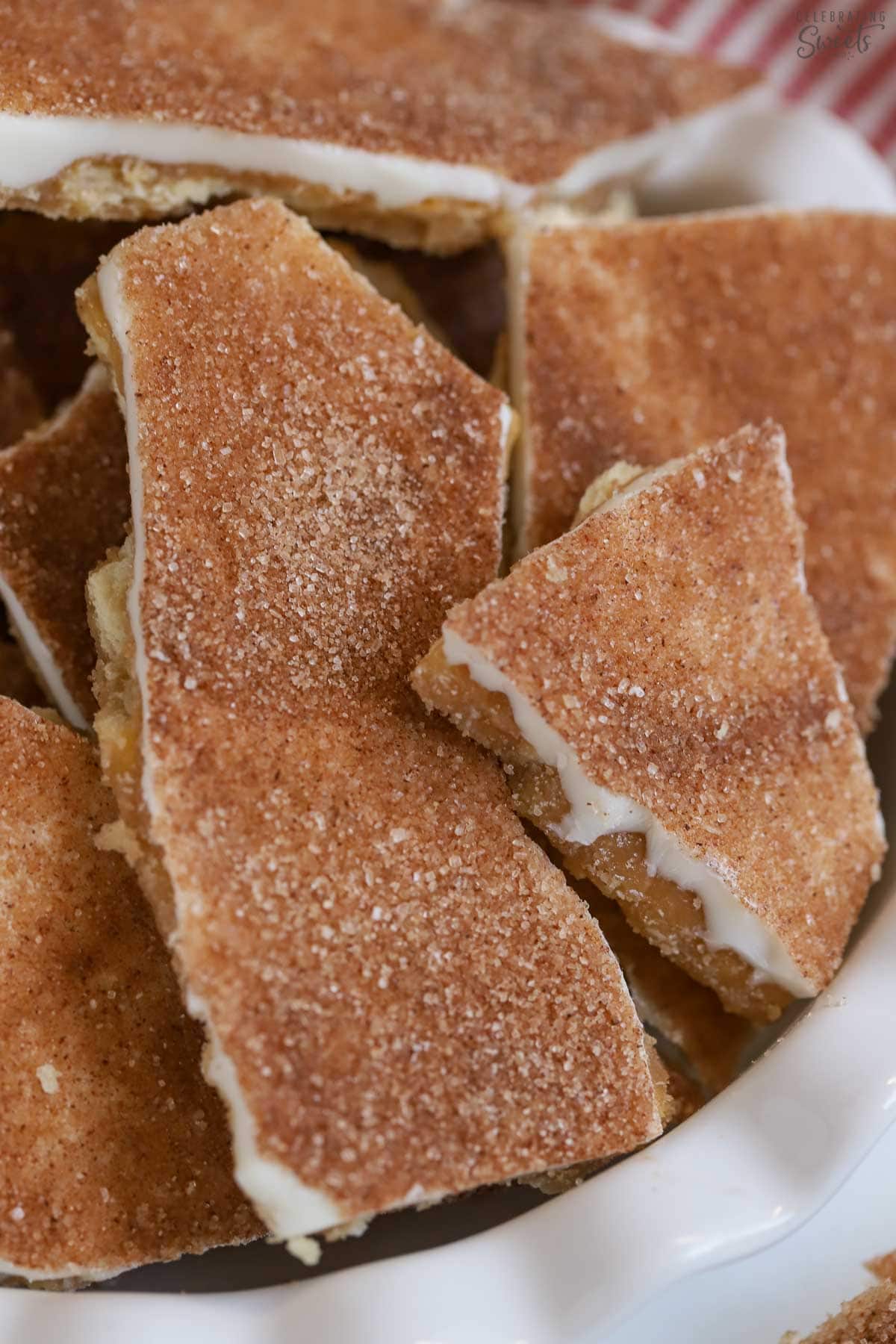 Close up of churro toffee topped with cinnamon sugar.