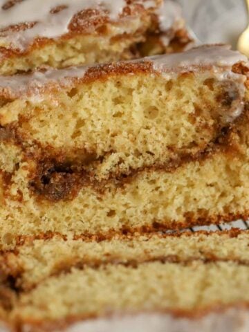 Slice of cinnamon swirl bread on a wire rack.