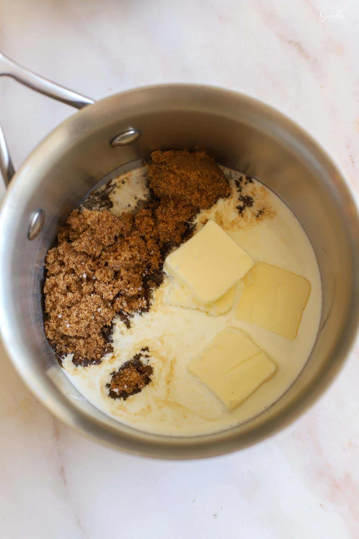 Brown sugar, butter, and cream in a saucepan.