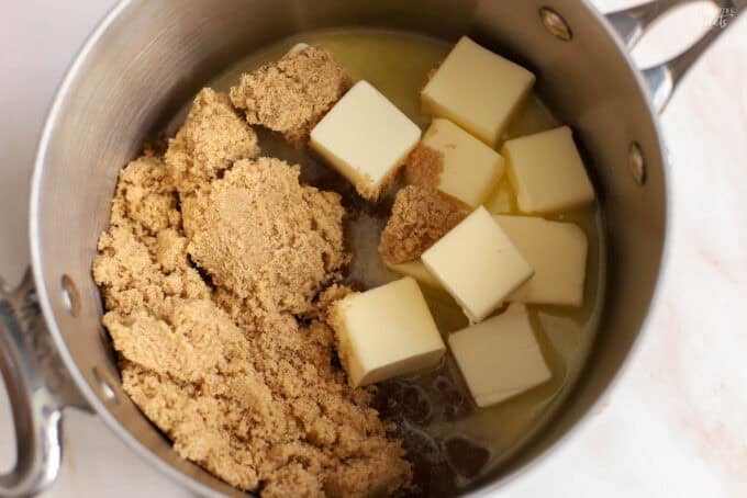 Butter and brown sugar in a saucepan.