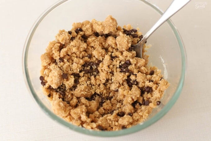 Chocolate chip crumb topping in a glass bowl.