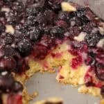 Lemon blueberry spoon cake in a metal baking pan.