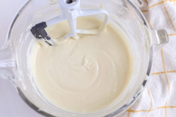 Cheesecake batter in a glass bowl.