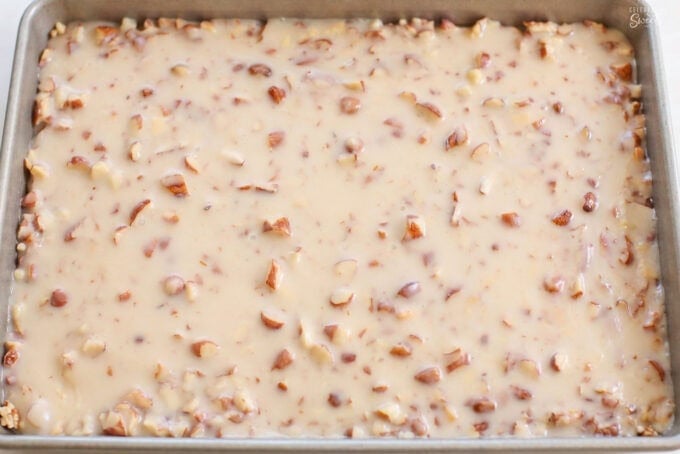 White Texas sheet cake in a rectangular pan.