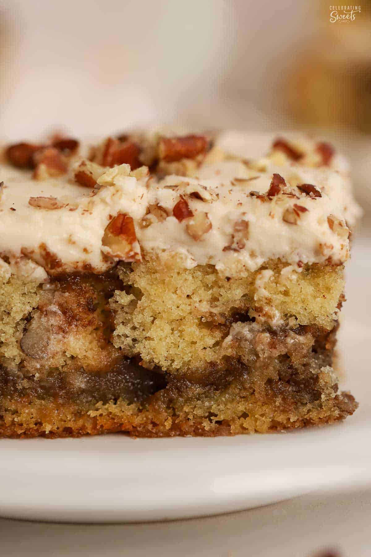 Closeup of maple pecan cake with cinnamon swirls.