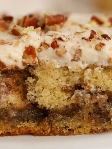 Closeup of maple pecan cake with cinnamon swirls.