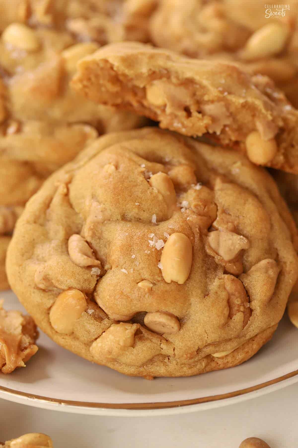 Chunky peanut cookie on a white plate.