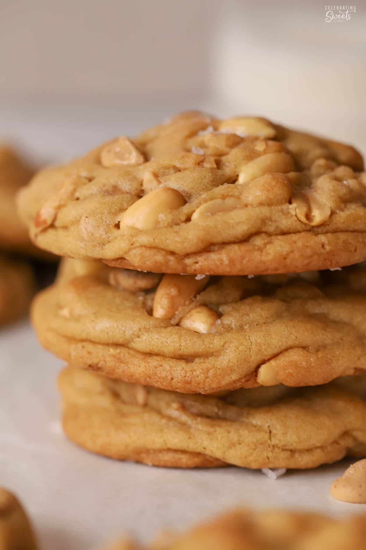 Stack of three peanut cookies.
